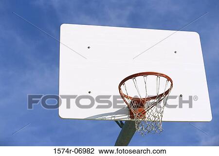 Low angle view of a basketball hoop View Large Photo Image Stock Image - Low angle view of a basketball hoop. Fotosearch