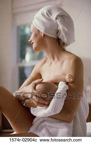 Mother breastfeeding her baby boy View Large Photo Image Stock Image - Mother breastfeeding her baby boy. Fotosearch