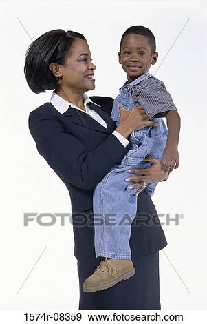 Stock Photo - Mother holding her son. Fotosearch