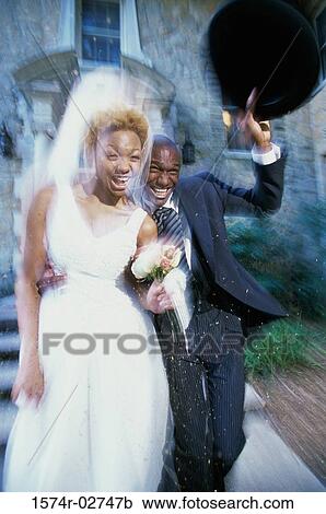 Newlywed couple running together View Large Photo Image Stock Image - Newlywed couple running together. Fotosearch