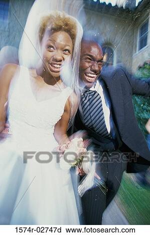 Newlywed couple running together View Large Photo Image Stock Image - Newlywed couple running together. Fotosearch