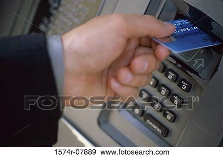 Person making an ATM transaction View Large Photo Image Stock Photo - Person making an ATM transaction. Fotosearch