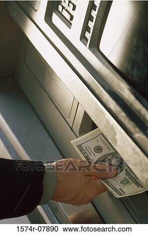 Person withdrawing cash from an ATM View Large Photo Image Stock Image - Person withdrawing cash from an ATM. Fotosearch