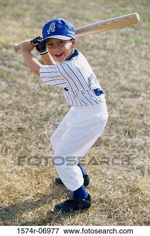 Portrait of a boy playing baseball View Large Photo Image Stock Photo - Portrait of a boy playing baseball. Fotosearch