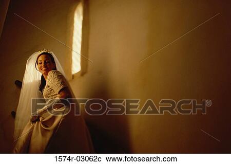 Portrait of a bride walking up stairs View Large Photo Image Stock Image - Portrait of a bride walking up stairs. Fotosearch