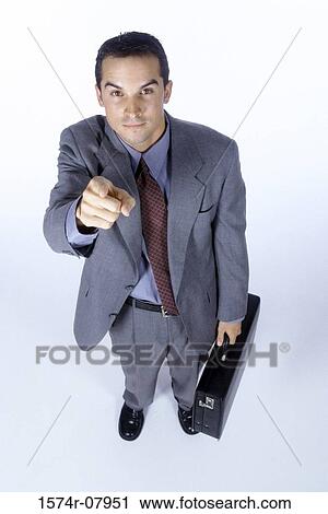 Portrait of a businessman pointing View Large Photo Image Stock Image - Portrait of a businessman pointing. Fotosearch