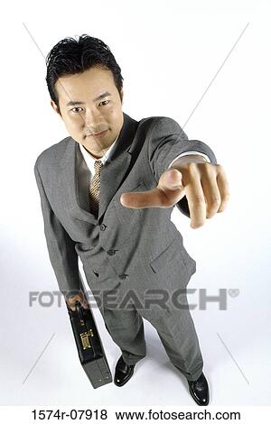 Portrait of a businessman pointing View Large Photo Image Stock Photo - Portrait of a businessman pointing. Fotosearch