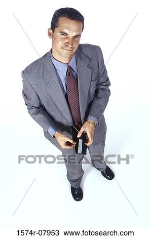 Portrait of a businessman smiling View Large Photo Image Stock Image - Portrait of a businessman smiling. Fotosearch