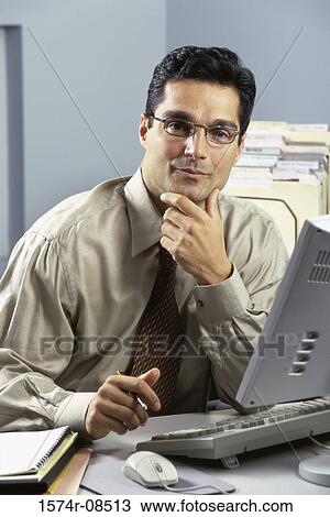 Portrait of a businessman smiling View Large Photo Image Stock Image - Portrait of a businessman smiling. Fotosearch