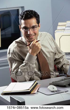 Stock Image - Portrait of a businessman smiling. Fotosearch