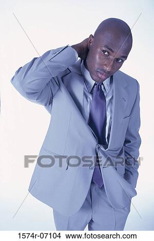 Portrait of a businessman thinking and looking away View Large Photo Image Picture - Portrait of a businessman thinking and looking away. Fotosearch
