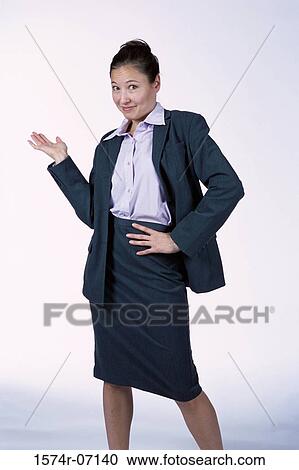 Portrait of a businesswoman gesturing with her hand View Large Photo Image Stock Image - Portrait of a businesswoman gesturing with her hand. Fotosearch