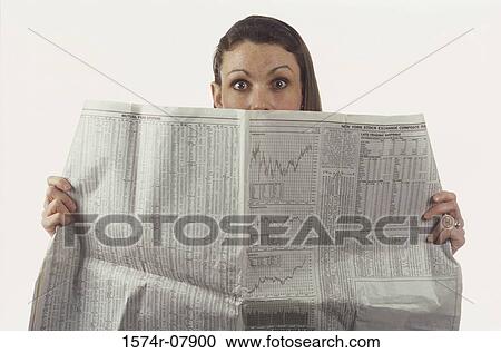 Portrait of a businesswoman holding a newspaper View Large Photo Image Stock Image - Portrait of a businesswoman holding a newspaper. Fotosearch