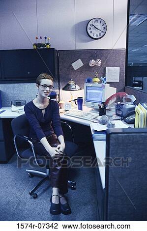 Portrait of a businesswoman smiling in an office View Large Photo Image Stock Image - Portrait of a businesswoman smiling in an office. Fotosearch