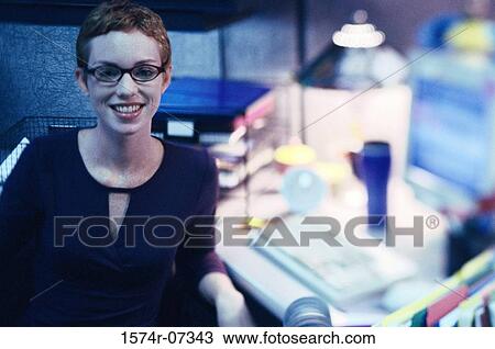 Portrait of a businesswoman smiling View Large Photo Image Stock Image - Portrait of a businesswoman smiling. Fotosearch