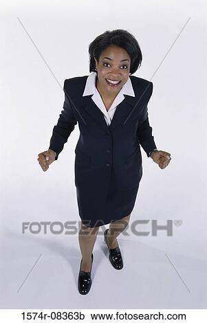 Stock Image - Portrait of a businesswoman smiling. Fotosearch