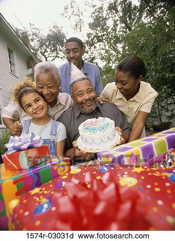 Portrait of a family at a birthday party View Large Photo Image Stock Image - Portrait of a family at a birthday party. Fotosearch