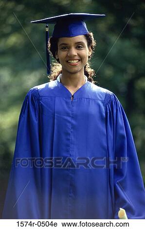 Portrait of a female graduate smiling View Large Photo Image Stock Image - Portrait of a female graduate smiling. Fotosearch