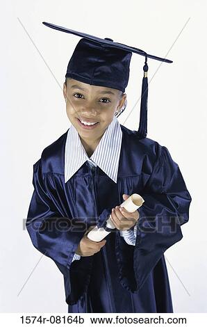 Portrait of a girl dressed in a graduation outfit holding a diploma View Large Photo Image Stock Image - Portrait of a girl dressed in a graduation outfit holding a diploma. Fotosearch
