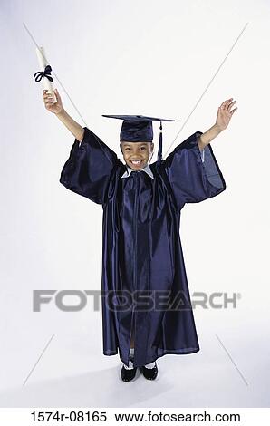 Portrait of a girl dressed in a graduation outfit holding a diploma View Large Photo Image Stock Photography - Portrait of a girl dressed in a graduation outfit holding a diploma. Fotosearch