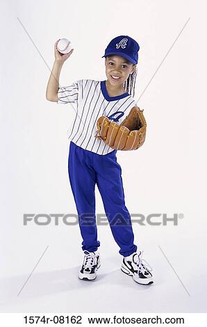 Stock Image - Portrait of a girl in a baseball uniform. Fotosearch