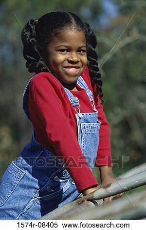 Stock Photography - Portrait of a girl playing. Fotosearch