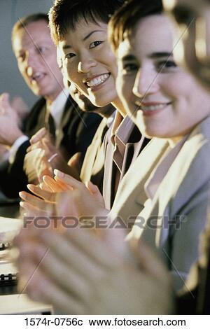 Portrait of a group of business executives applauding in a meeting View Large Photo Image Stock Image - Portrait of a group of business executives applauding in a meeting. Fotosearch