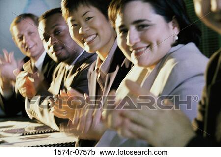 Portrait of a group of business executives applauding in a meeting View Large Photo Image Stock Image - Portrait of a group of business executives applauding in a meeting. Fotosearch