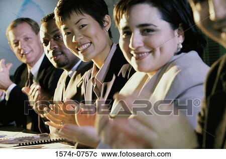 Portrait of a group of business executives applauding in a meeting View Large Photo Image Stock Image - Portrait of a group of business executives applauding in a meeting. Fotosearch