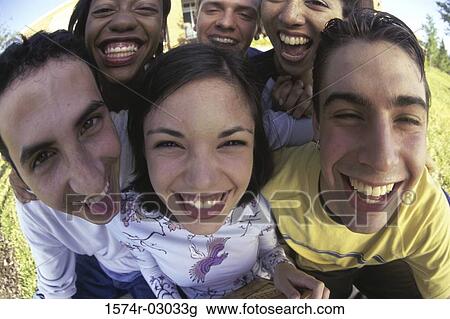Portrait of a group of teenagers smiling View Large Photo Image Stock Image - Portrait of a group of teenagers smiling. Fotosearch