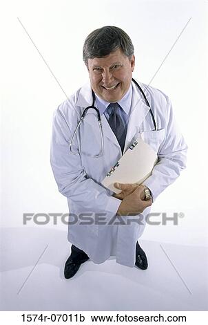 Stock Image - Portrait of a male doctor with a stethoscope around his neck. Fotosearch
