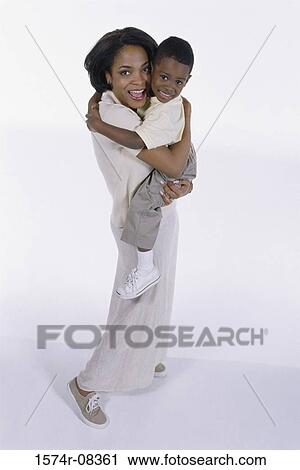 Portrait of a mother and her son View Large Photo Image Stock Image - Portrait of a mother and her son. Fotosearch