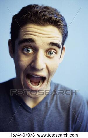 Portrait of a teenage boy with his mouth wide open View Large Photo Image Stock Image - Portrait of a teenage boy with his mouth wide open. Fotosearch