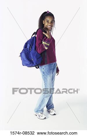 Portrait of a teenage girl carrying a backpack View Large Photo Image Stock Image - Portrait of a teenage girl carrying a backpack. Fotosearch