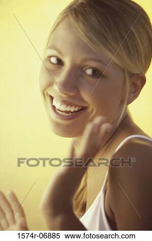 Stock Photography - Portrait of a teenage girl smiling. Fotosearch