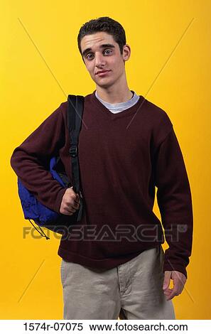 Portrait of a teenager boy carrying a backpack View Large Photo Image Stock Photography - Portrait of a teenager boy carrying a backpack. Fotosearch