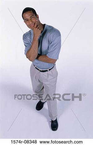 Stock Photo - Portrait of a young man smiling. Fotosearch