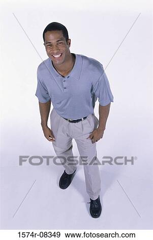 Stock Photo - Portrait of a young man smiling. Fotosearch