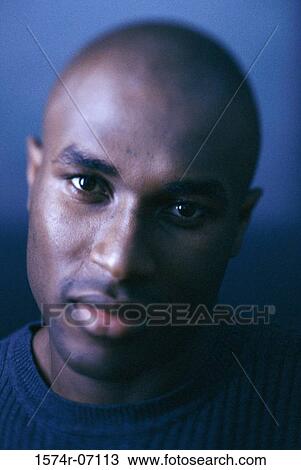 Stock Image - Portrait of a young man. Fotosearch