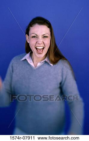 Stock Image - Portrait of a young pregnant woman smiling. Fotosearch