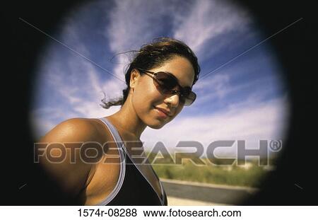 Stock Photo - Portrait of a young woman. Fotosearch