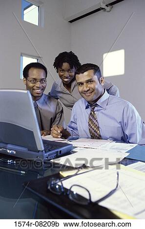 Portrait of business executives in an office View Large Photo Image Stock Image - Portrait of business executives in an office. Fotosearch