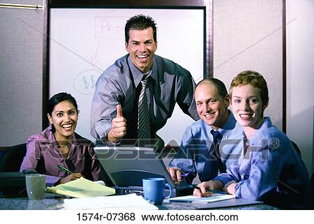 Portrait of business executives in an office View Large Photo Image Stock Photo - Portrait of business executives in an office. Fotosearch