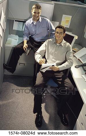 Stock Image - Portrait of two businessmen smiling. Fotosearch