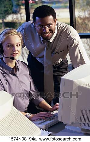 Portrait of two customer service representatives smiling View Large Photo Image Stock Image - Portrait of two customer service representatives smiling. Fotosearch