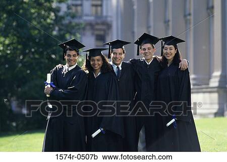 Stock Image - Portrait of two female graduates and three male graduates holding diplomas. Fotosearch