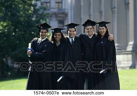 Stock Image - Portrait of two female graduates and three male graduates holding diplomas. Fotosearch