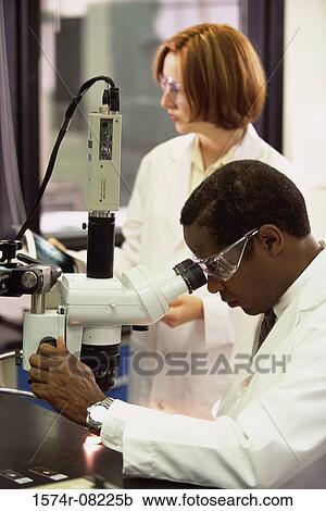 Stock Image - Researchers working in a laboratory. Fotosearch