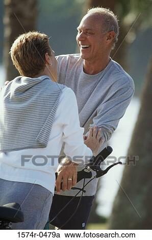 Stock Image - Senior couple laughing. Fotosearch