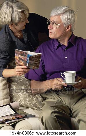 Stock Image - Senior couple looking at each other. Fotosearch